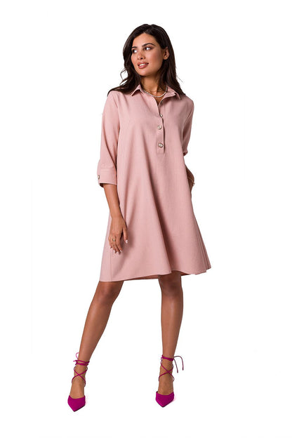 Elegant BeWear shirt dress in soft pink with flared neckline and bottom, ideal for both work and vacation. Designed for a stylish silhouette and comfort.