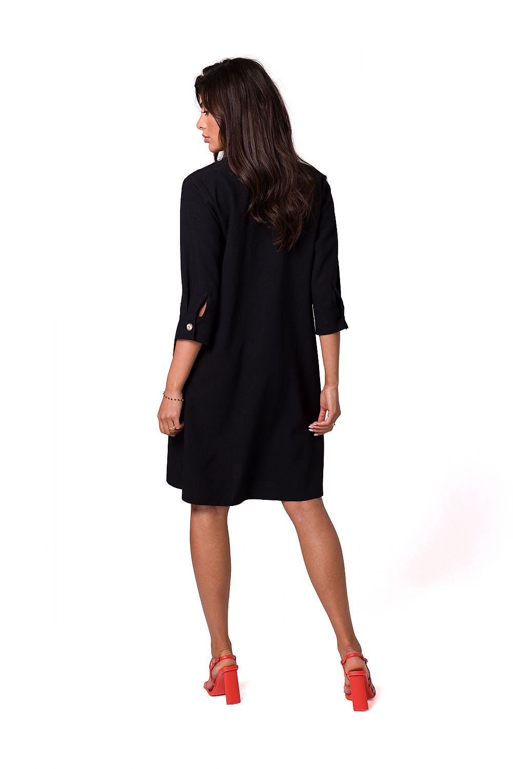 Back view of the elegant BeWear black shirt dress, showcasing the flared design and sophisticated button detailing.