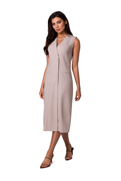 Elegant sleeveless daydress by BeWear, showcasing a minimalist design in a soft beige tone, featuring a button closure and chic pockets, perfect for warm summer outings.
