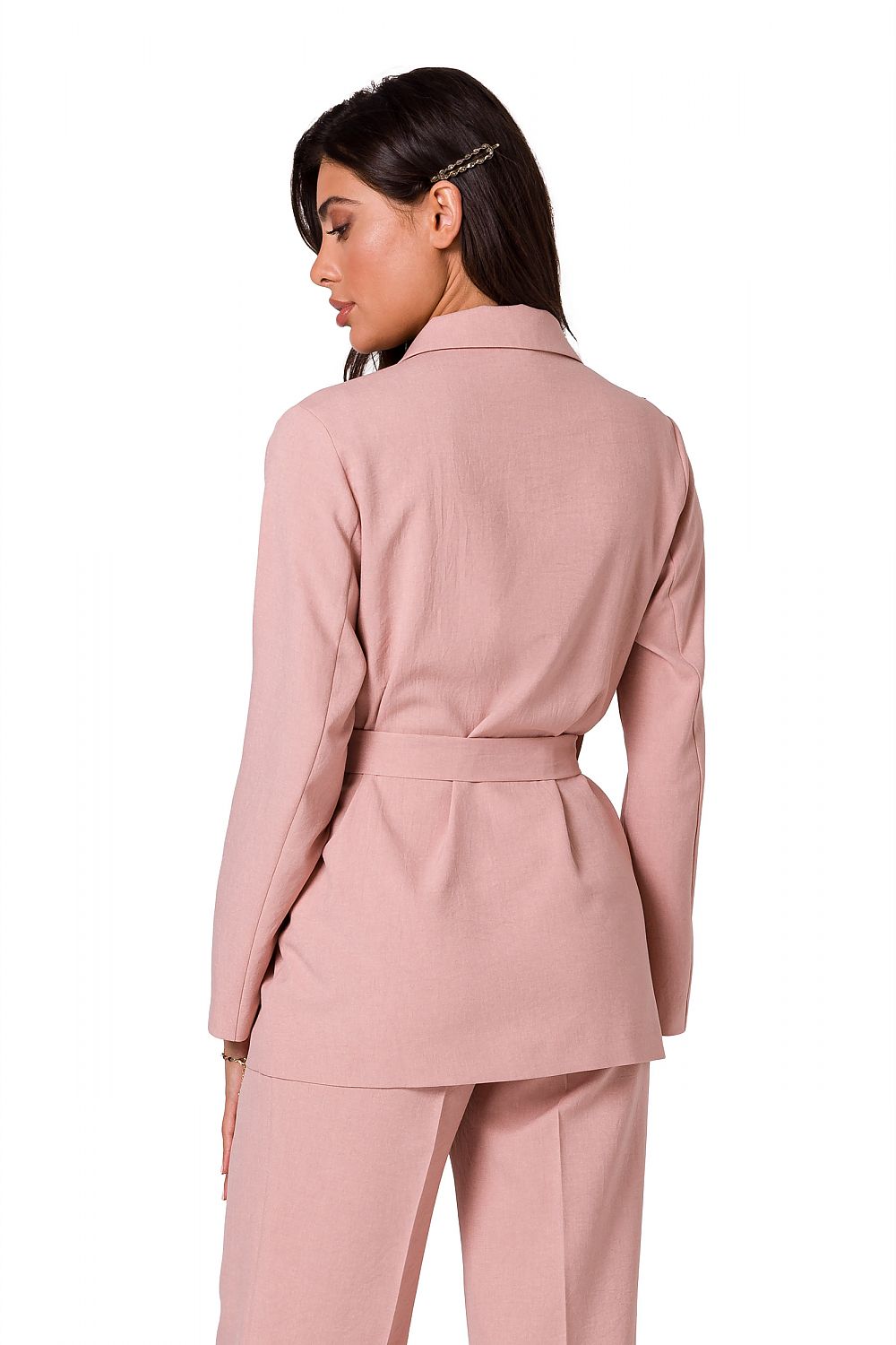 Stylish back view of a woman in a pink lightweight summer jacket with a belt from BeWear, exuding elegance and sophistication.