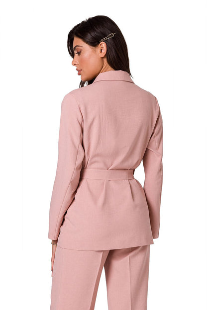 Stylish back view of a woman in a pink lightweight summer jacket with a belt from BeWear, exuding elegance and sophistication.