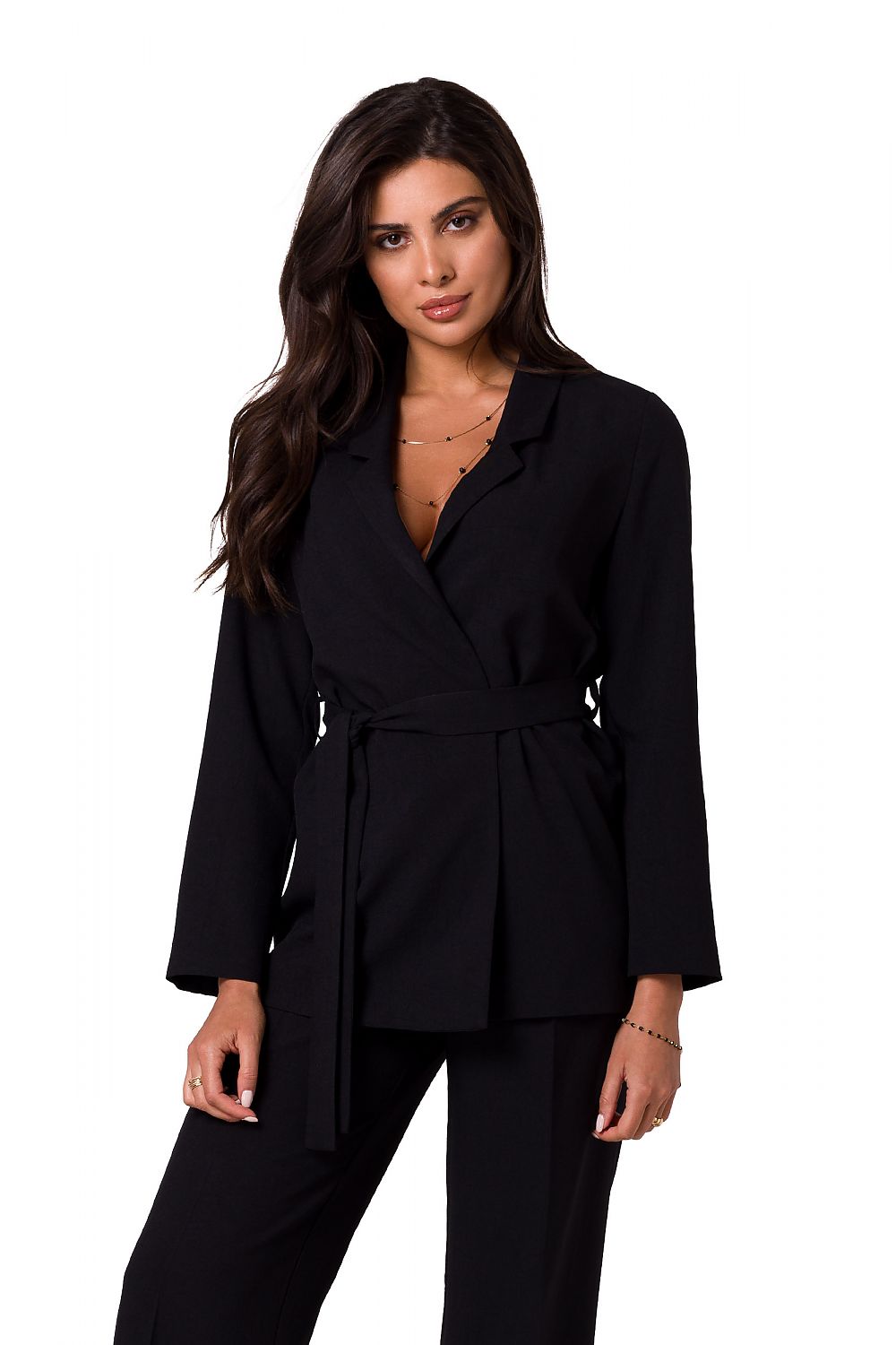 Chic model presenting a black lightweight unbuttoned BeWear summer jacket with belt, exuding elegance and refinement in a polished look.