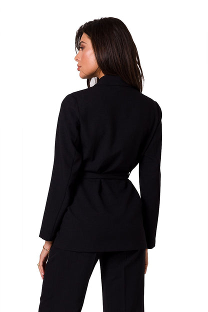 Back view of a model in a black BeWear summer jacket with belt, showcasing the elegance and tailored cut perfect for luxurious summer styling.