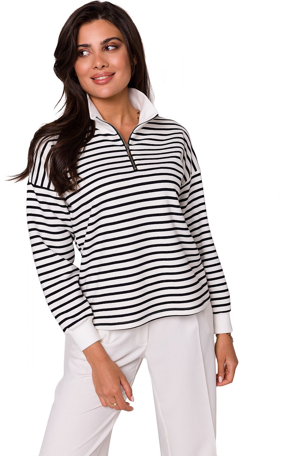 Elegant woman wearing a BeWear high collar zip sweatshirt in a classic black and white striped design, exuding luxury and comfort for stylish spring and summer outings.