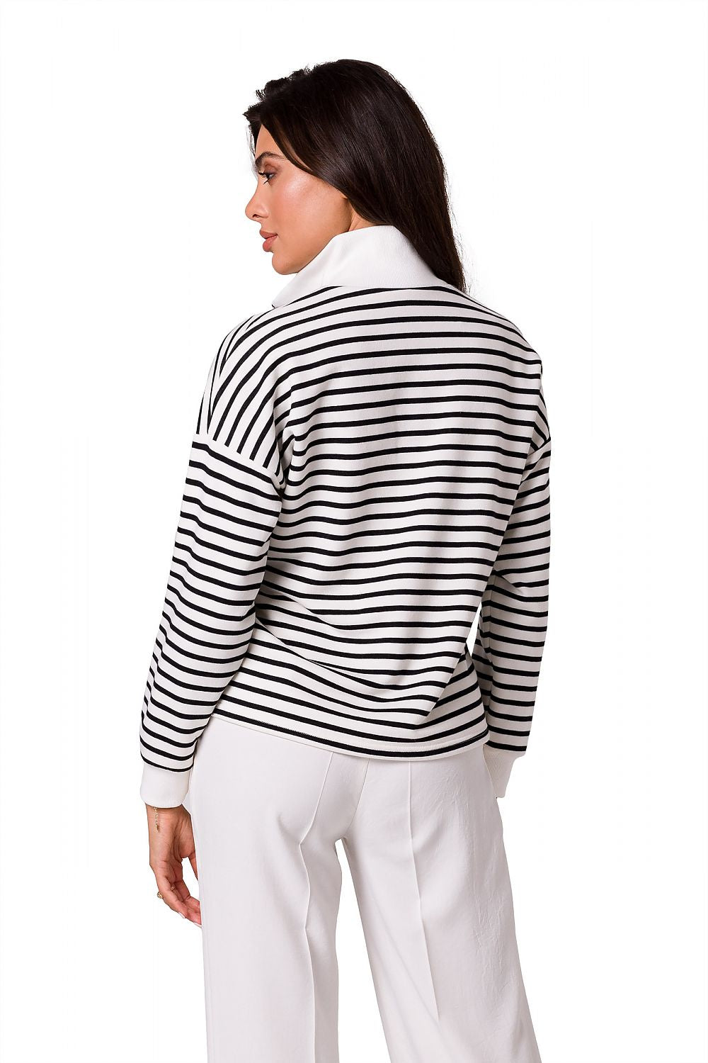 Sophisticated rear view of a woman in a BeWear high collar zip sweatshirt, highlighting its striped design and the elegant fit perfect for luxury lifestyle.