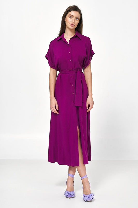 Elegant shirt dress in vibrant purple by Nife, featuring a loose fit design, button-down front, and stylish belt, perfect for warm spring days.