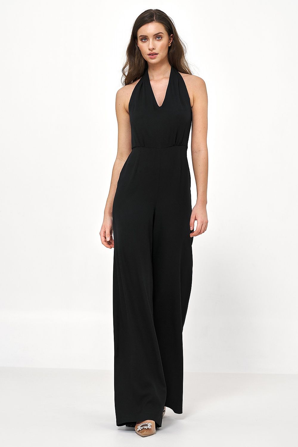 Sophisticated black backless jumpsuit by Nife, designed with a flattering neckline and flowing silhouette.