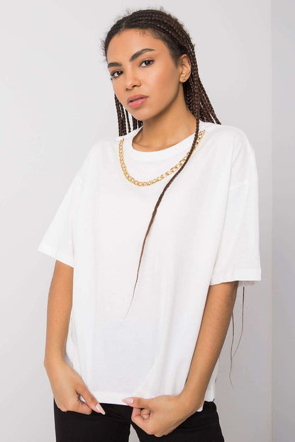 Front view of a chic white loose-fit women's t-shirt by Rue Paris adorned with a decorative chain, epitomising modern luxury.