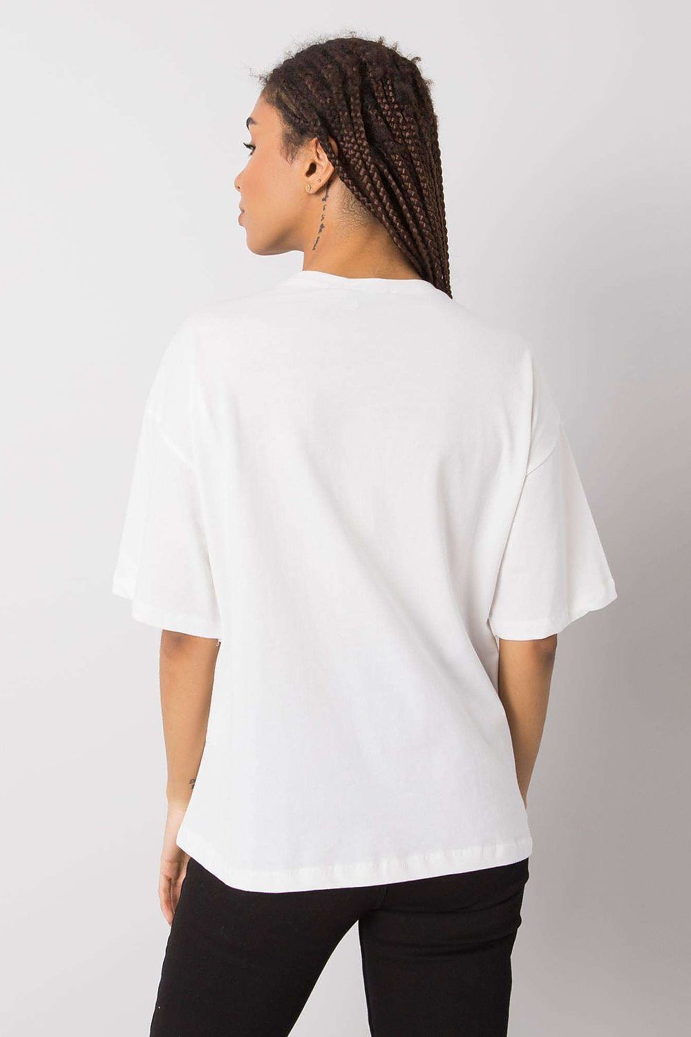 Back view of a sophisticated women's loose-fit white t-shirt by Rue Paris, highlighting its relaxed design and luxurious cotton fabric.