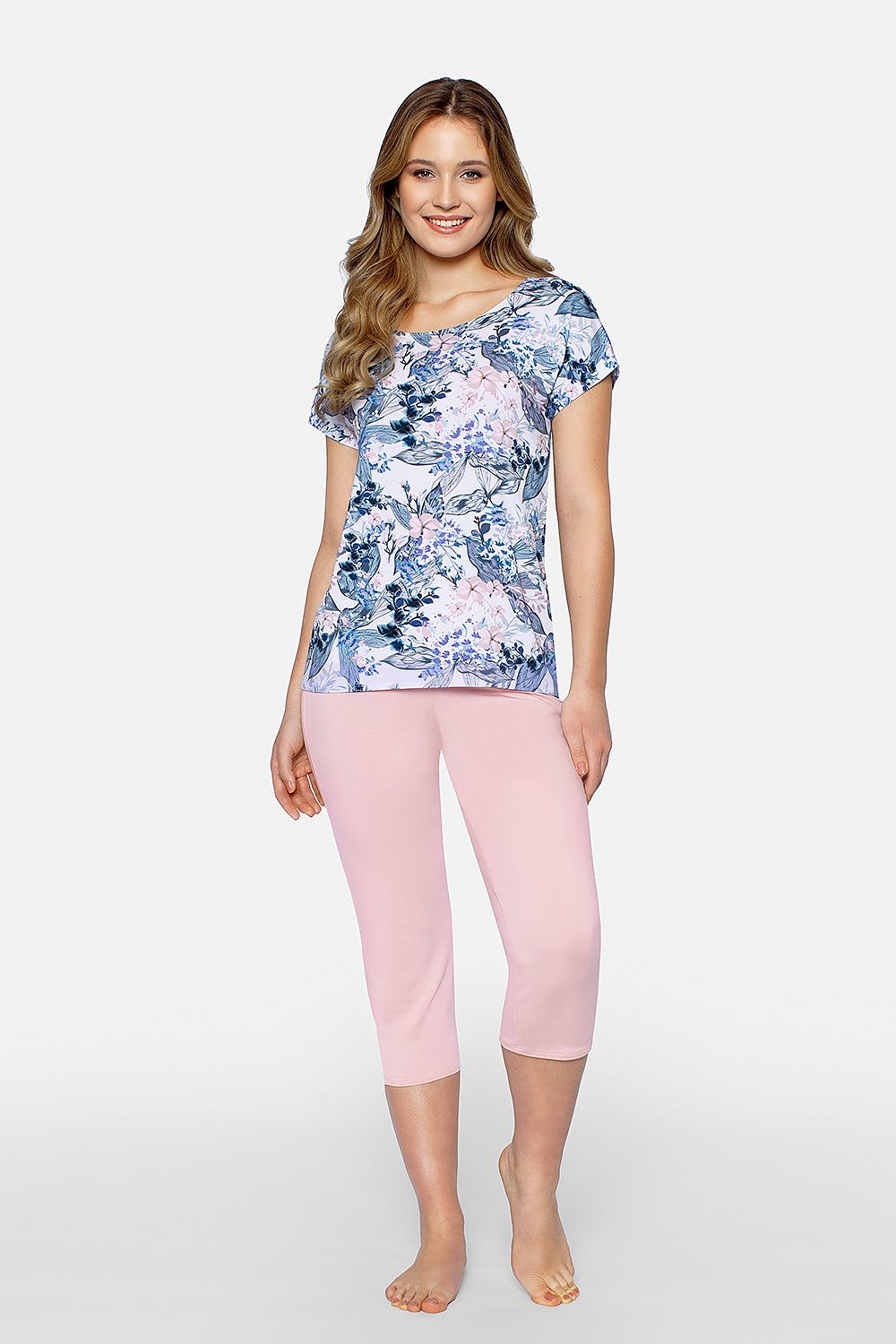 Luxurious Babella women's pastel pyjama set featuring a floral boat neck blouse and elegant 3/4 trousers in soft pink, perfect for a chic and comfortable night's sleep.