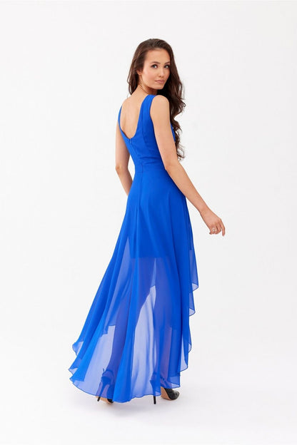 Graceful rear view of the blue chiffon evening dress by Roco Fashion, showcasing its flowing silhouette and elegant design.