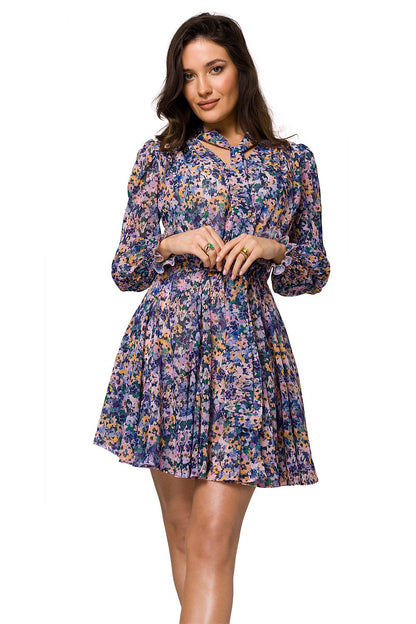 Floral chiffon mini dress with long sleeves and a flared skirt, elegantly styled by Makover, shown from the front.