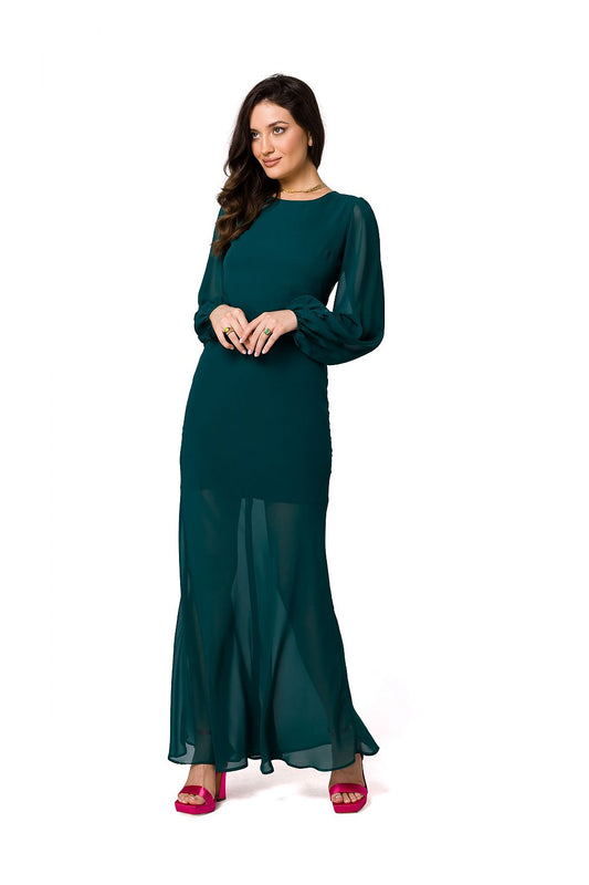 Stylish woman modelling an Elegant Chiffon Evening Maxi Dress with Open Back and Boning by Makover, featuring delicate chiffon fabric and a sophisticated design, perfect for special occasions.