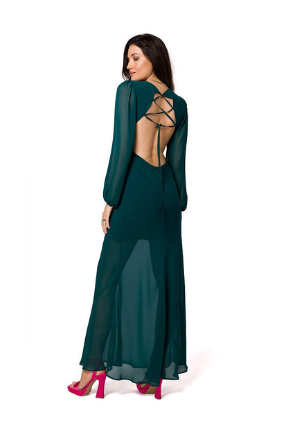 Back view of a woman in an Elegant Chiffon Evening Maxi Dress with Open Back by Makover, highlighting the intricate lace-up design and flowing chiffon material, ideal for elegant events.