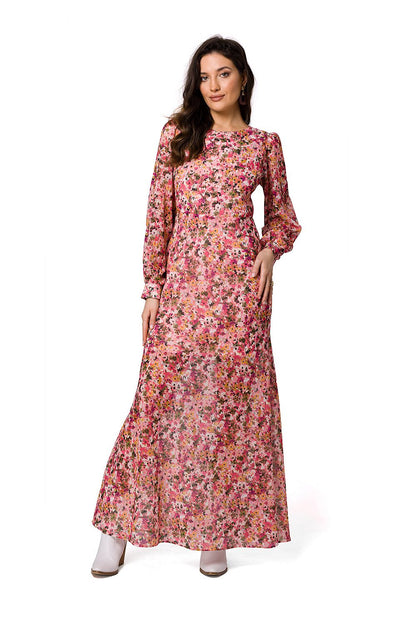 Chic pink floral chiffon evening maxi dress by Makover, highlighted on a graceful model, ideal for glamorous events.