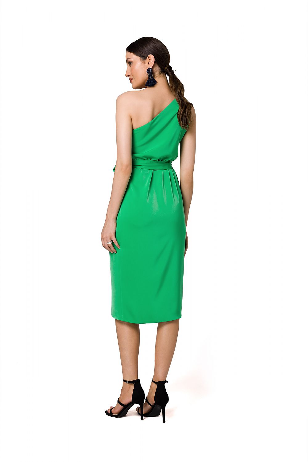 Back view of the fashionable green one-shoulder cocktail dress by Makover, featuring elegant draping and a cinched waist.