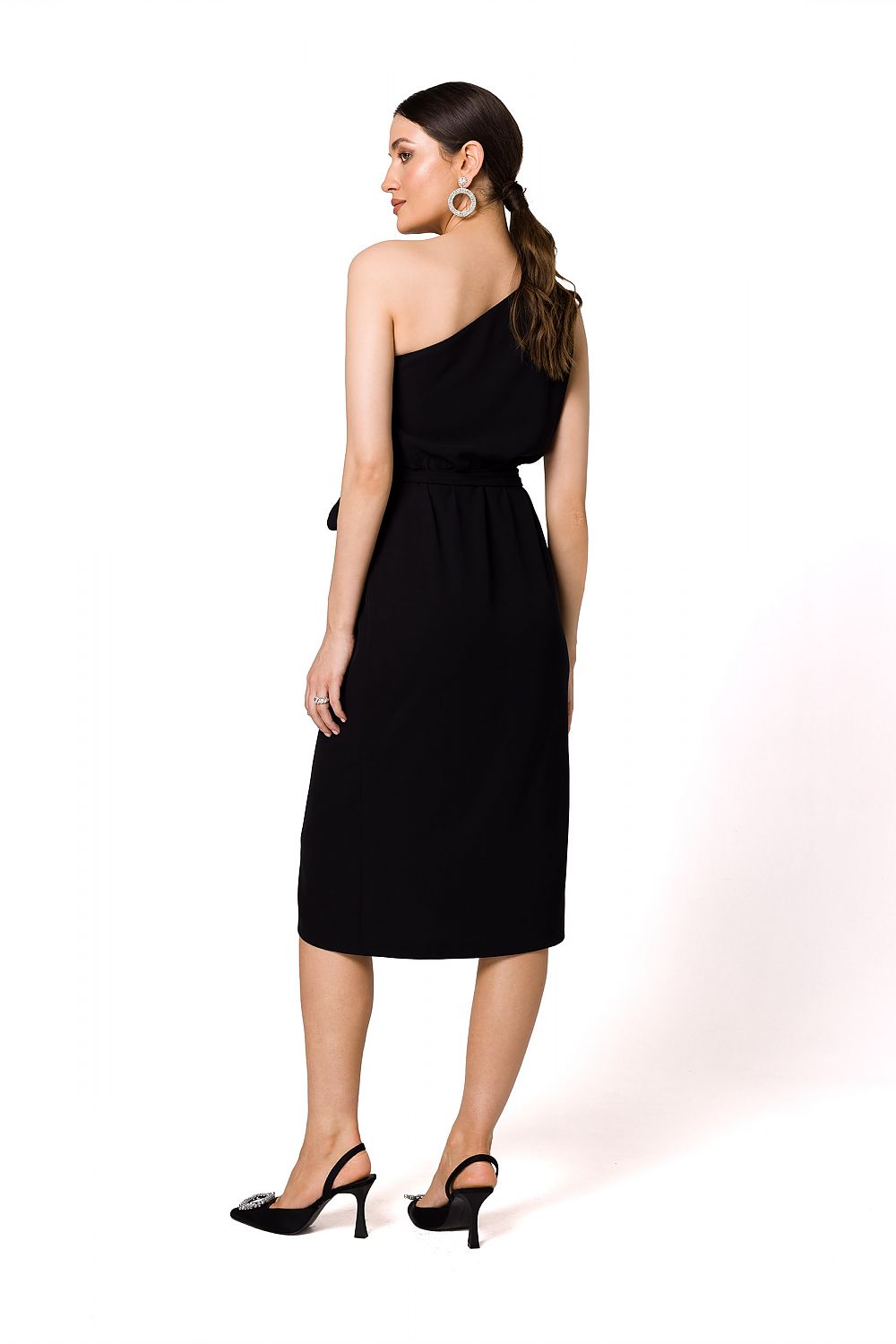 Back view of an elegant black one-shoulder cocktail dress featuring draped detailing and a flattering belt, designed by Makover.