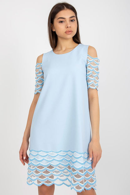 An elegant cocktail dress by Lakerta in a serene light blue hue, featuring intricate openwork sleeves and a beautifully detailed hem, perfect for sophisticated occasions. Sizes available from EU 36 to 42.