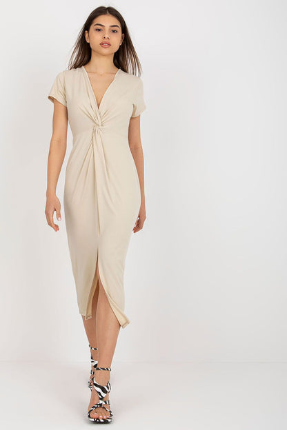 Elegant straight cut daydress with a heart neckline, featuring short sleeves and a decorative crease, designed by Italy Moda, perfect for effortless luxury.
