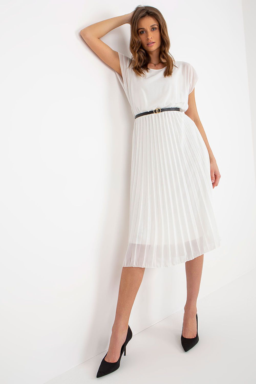 Stylish white cocktail dress by Italy Moda with pleated skirt and black belt, embodying elegance for formal events.