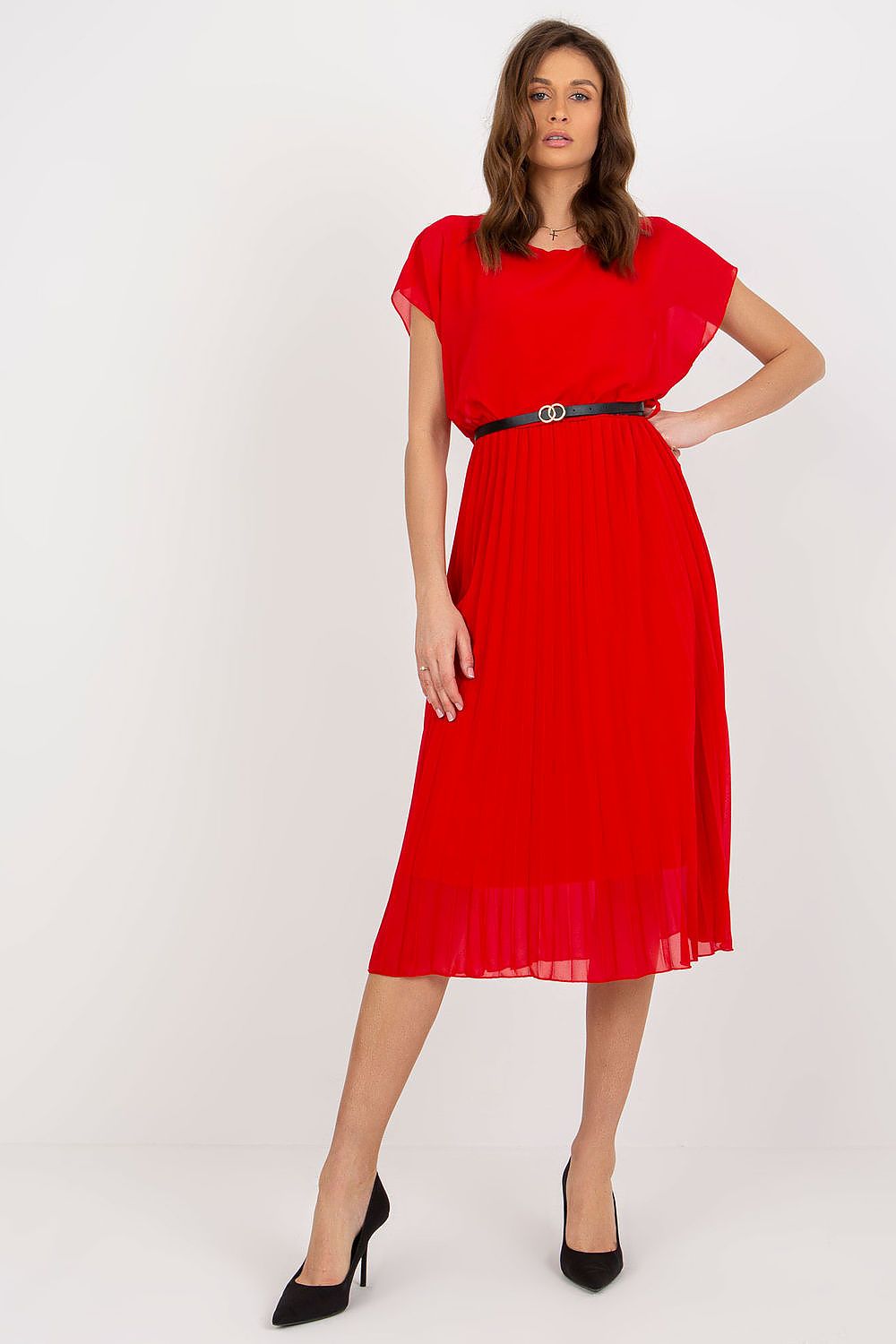 Stunning red cocktail dress by Italy Moda featuring a pleated skirt and black belt, worn by a model in a sophisticated pose ideal for upscale events.