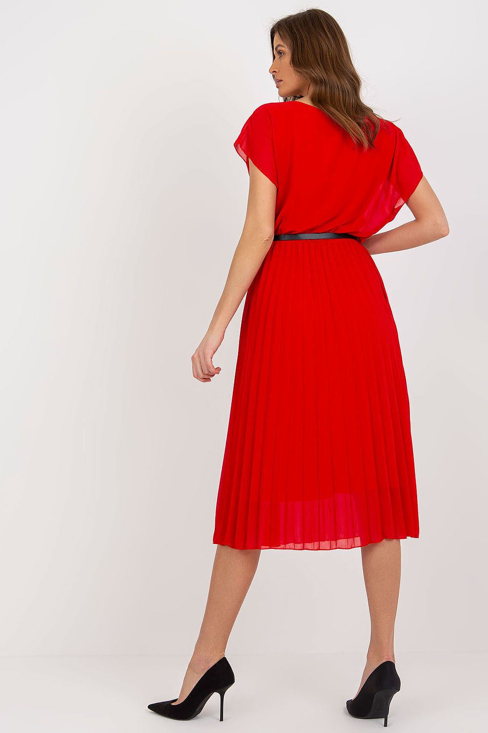 Back view of an exquisite red cocktail dress by Italy Moda, featuring a pleated skirt and a chic black belt, elegantly modeled for premium event styling.