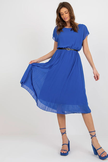 Captivating Italy Moda dress in bold blue with exquisite pleating and a chic black belt, model showing the motion of the dress, ideal for upscale events.