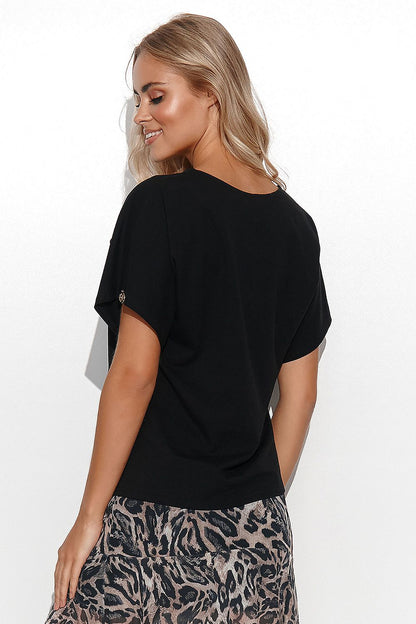 Classic black blouse by Makadamia, designed with a relaxed silhouette and stylish short sleeves, complemented by a chic animal print skirt for a sophisticated ensemble.