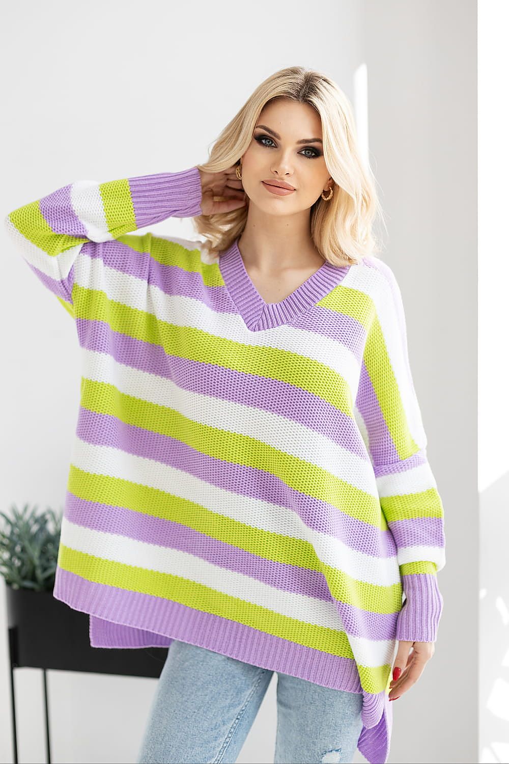 Stylish and vibrant acrylic sweater with colourful stripes by PeeKaBoo, designed for a chic look with a heart neckline.