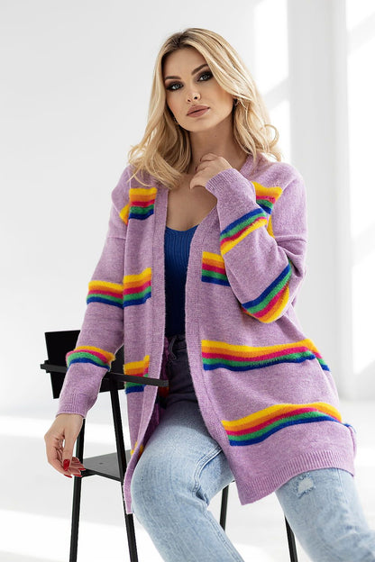 Elegant woman showcasing a luxurious striped cardigan by PeeKaBoo, featuring a loose fit, vibrant colourful stripes, and long sleeves. Ideal for stylish layering, perfect for chic casual wear.