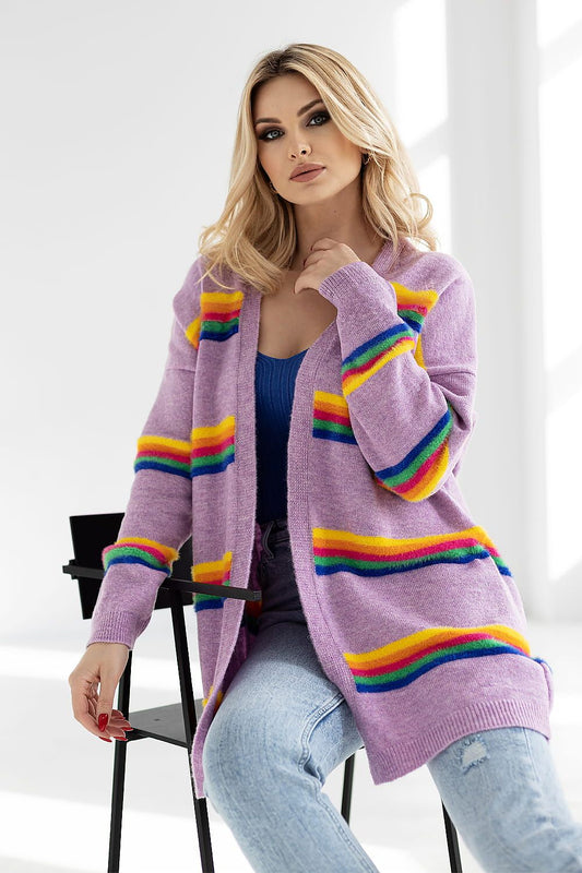 Elegant woman showcasing a luxurious striped cardigan by PeeKaBoo, featuring a loose fit, vibrant colourful stripes, and long sleeves. Ideal for stylish layering, perfect for chic casual wear.