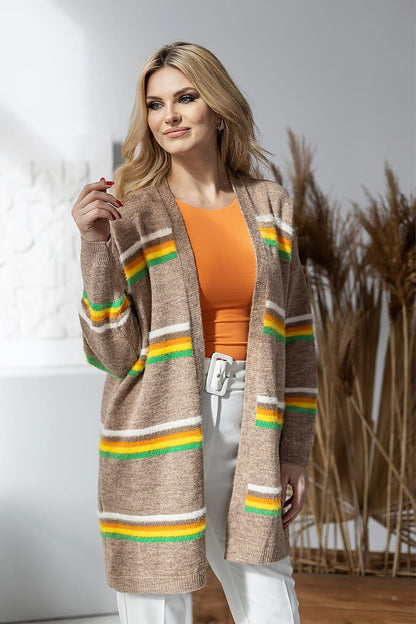 Luxurious PeeKaBoo striped cardigan modelled elegantly with long sleeves, featuring vibrant green and yellow stripes over a subtle beige background, creating a chic loose fit look.