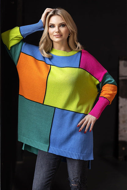 Explore the elegance of the PeeKaBoo Colour Block Loose-Fitting Sweater, showcasing a vibrant design with long sleeves, perfect for sophisticated layering in any wardrobe.