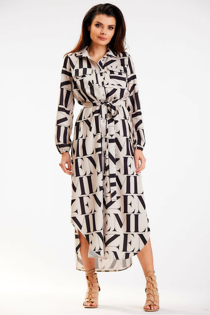 Luxurious Awama shirt maxi dress featuring a stylish belted waist, long sleeves, and contemporary graphic prints, beautifully tailored in Poland.