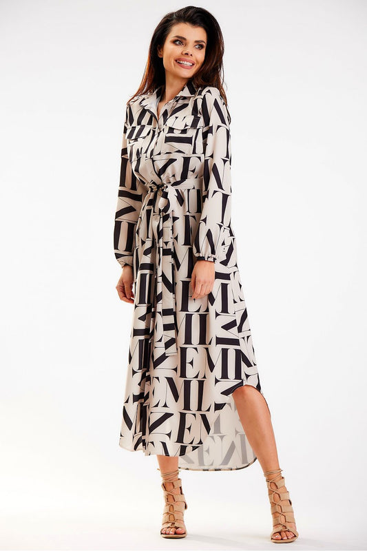 Sleek Awama maxi dress with elegant long sleeves and a chic belt, showcasing a fashionable design and flattering silhouette, crafted in Poland.