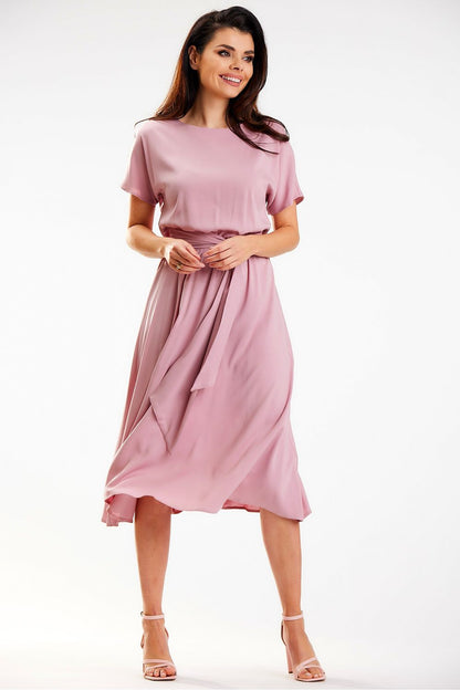 Elegant midi length kimono dress in soft pink by Awama, showcasing a flattering silhouette with sash detail. Perfect for both work and leisure wear.