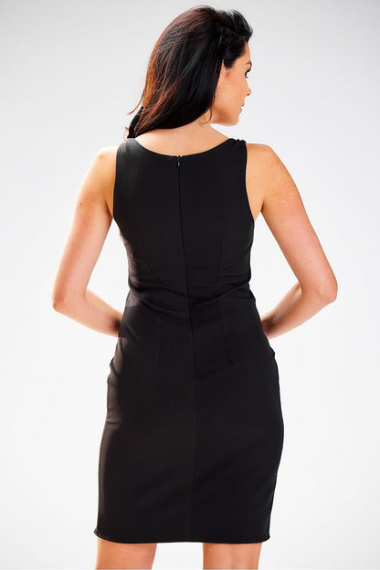 Elegant fitted black daydress by Awama, showcasing decorative shoulder binding and a sophisticated back zip closure, crafted for a refined look.