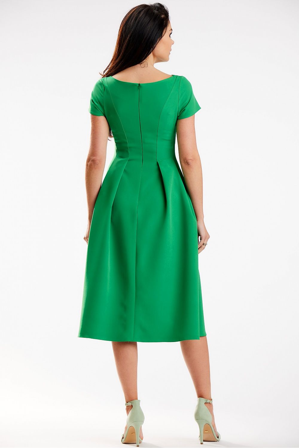 Elegant green midi dress with a boat neckline and short sleeves, showcasing a flattering fit, designed by Awama, perfect for special occasions.