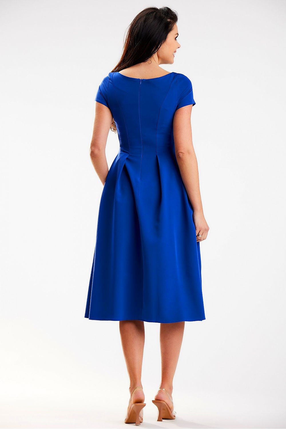 Back view of a stylish midi dress by Awama with a concealed zipper and a beautifully pleated skirt in striking blue.