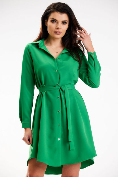 Elegant Awama shirt mini dress in vibrant green featuring long sleeves and a cinched belt, showcasing a sophisticated style for women.