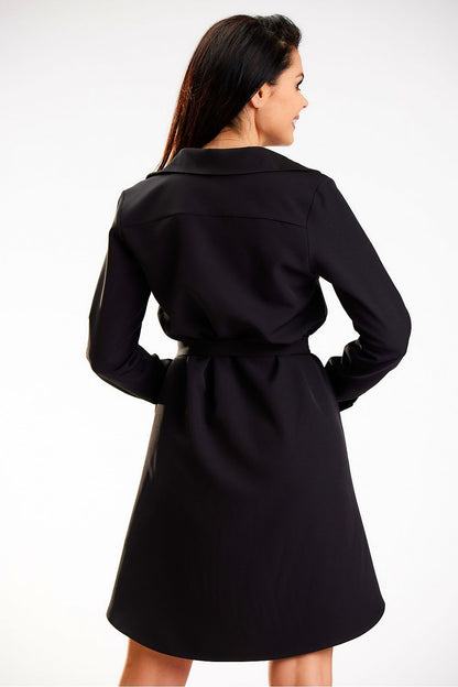 Elegant back view of an Awama shirt mini dress featuring long sleeves and a cinched belt, designed for a luxurious silhouette.