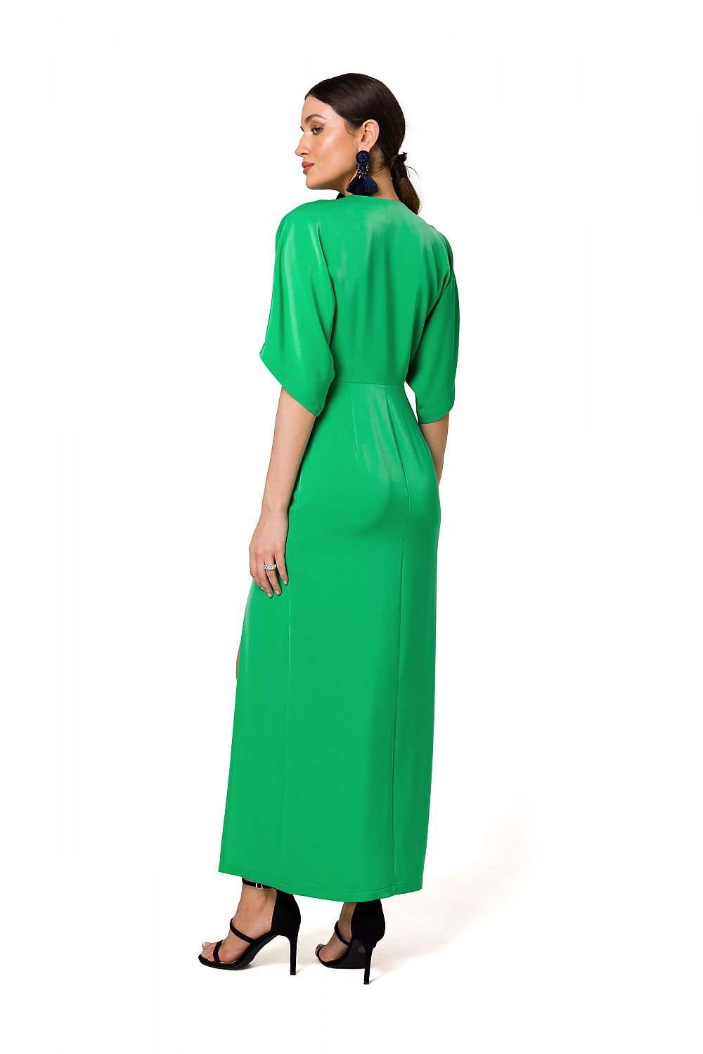 Back view of a stunning green evening dress with kimono sleeves and deep V neckline by Makover, showcasing the elegant fit.