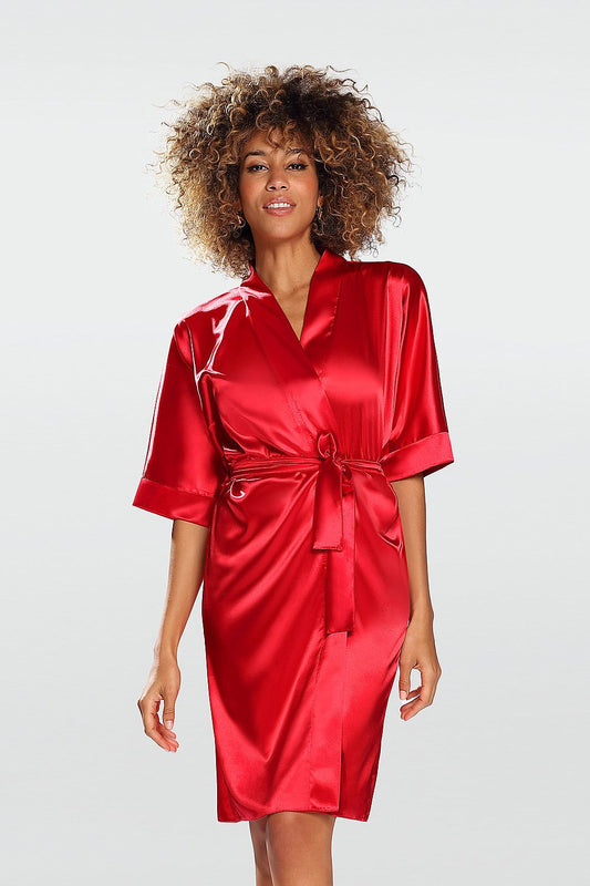 DCare Short-Sleeved Satin Bathrobe in Red, showcasing an elegant fit and waist tie, modelled by a woman with curly hair, exuding luxury and comfort.