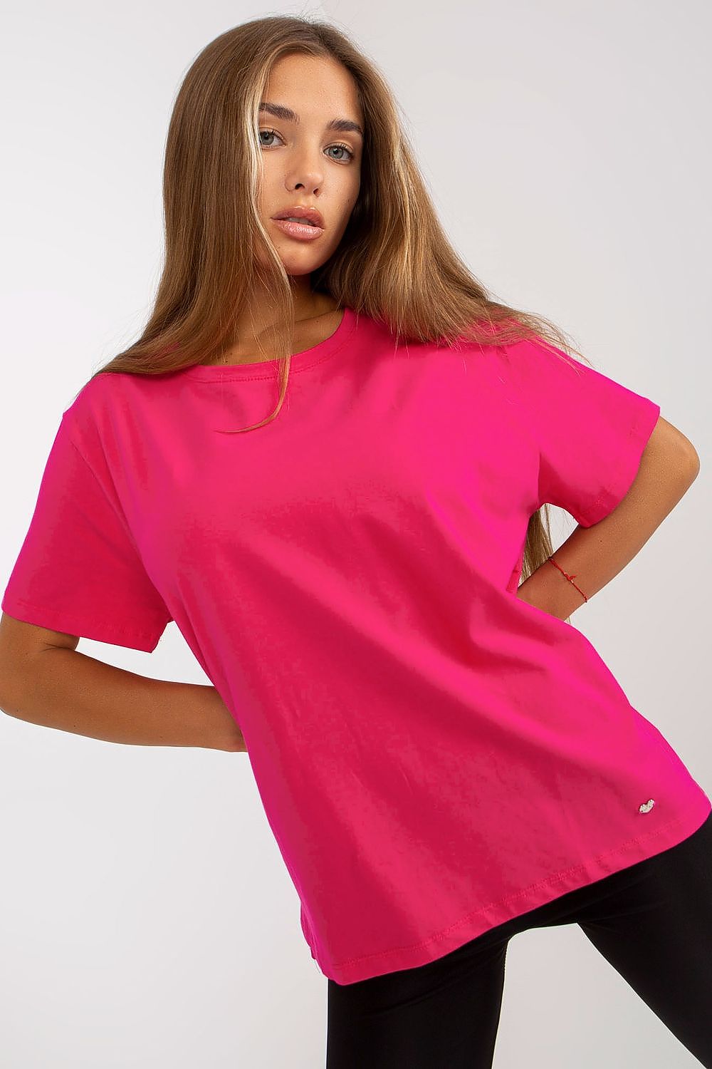 Luxury women's short sleeve t-shirt in vibrant pink by BFG, featuring a round neckline and crafted from a blend of 90% cotton and 10% spandex for a comfortable fit.