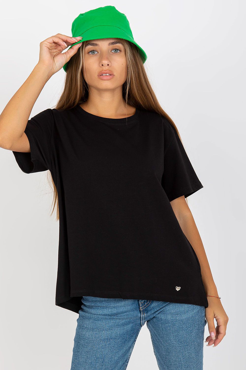 Model wearing Luxury Women's BFG T-Shirt in classic black, complemented by a green bucket hat and blue jeans. A chic and versatile look for any occasion.