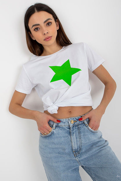 Luxury women's white cotton spandex BFG T-shirt featuring a vibrant green star print, styled with rolled sleeves and a knotted front for a chic casual look.