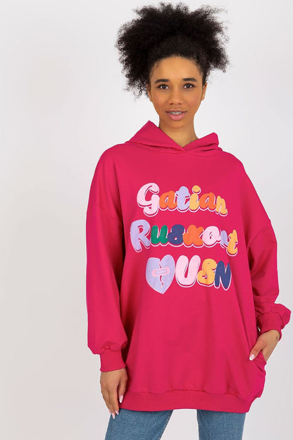 Elegant women's pink hooded sweatshirt featuring colourful decorative text, by Fancy, a stylish choice for comfortable outings.