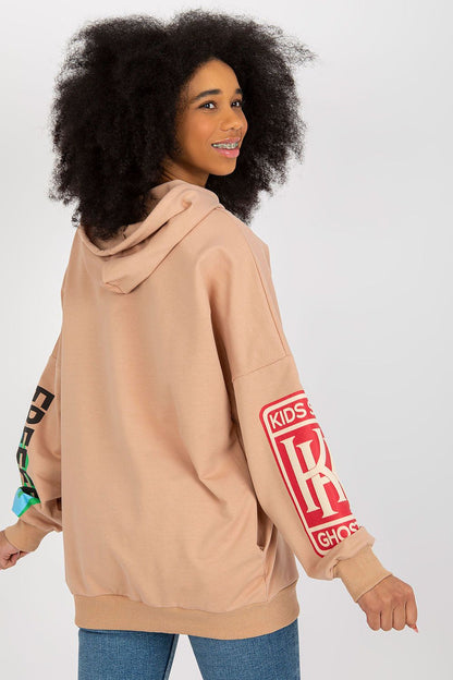 Fashion-forward women's hoodie from Fancy, designed with long sleeves and striking graphics, perfect for a trendy winter outfit.