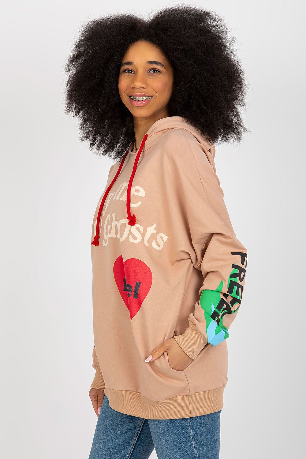 Sophisticated women's hoodie sweatshirt from Fancy, featuring a unique design with long sleeves and practical side pockets.
