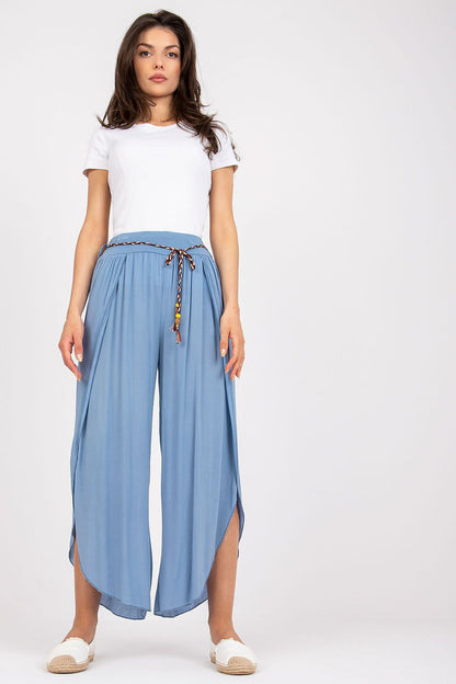 Sophisticated high-waist trousers in blue by Och Bella, highlighting the decorative waist tie, depicted in a fashionable front pose.